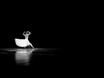 woman in white dress walking on water